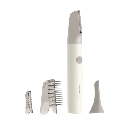 Todos los accesorios de la recortadora íntima TOUCHBeauty VIO ordenados junto al equipo